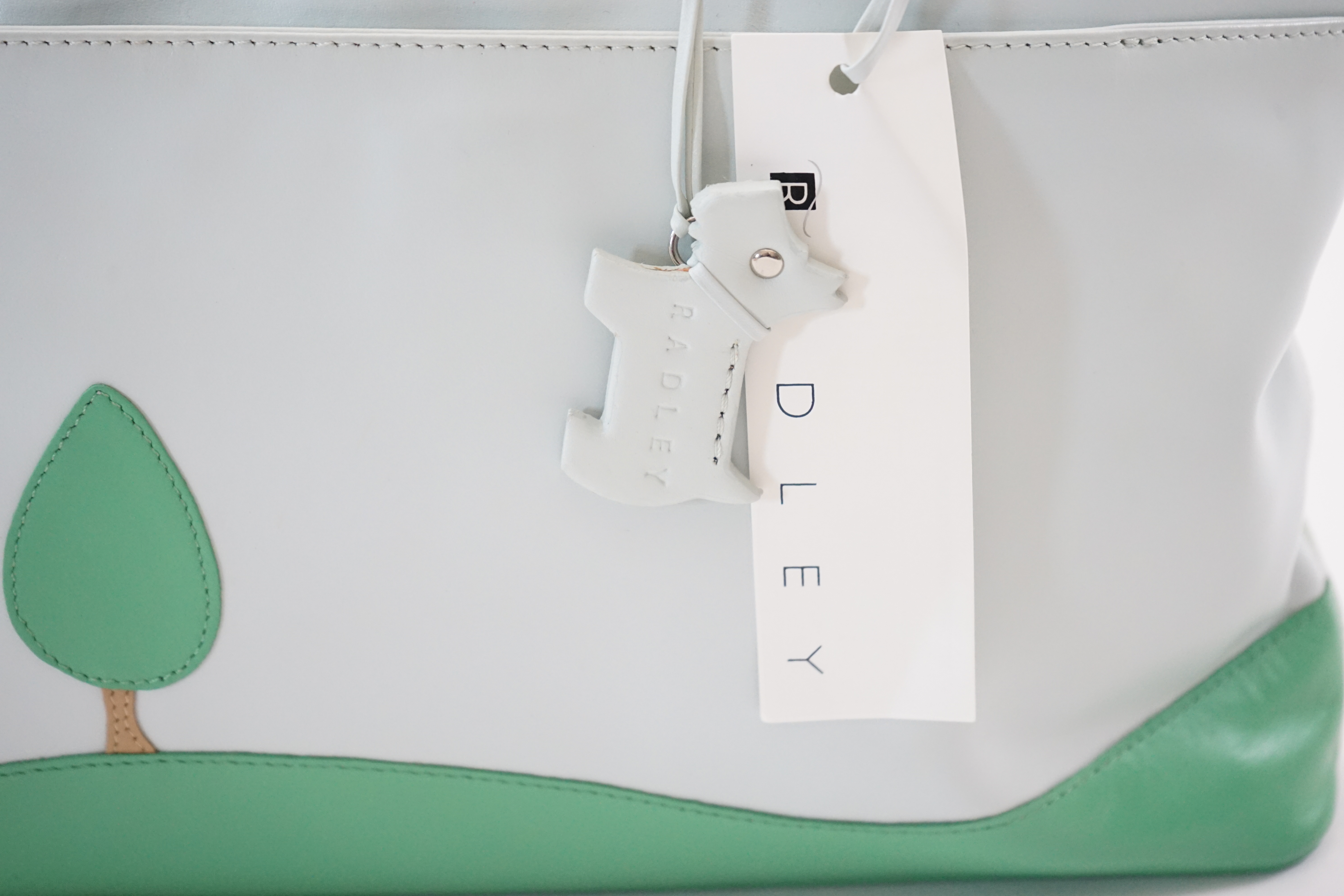 A Radley 'Up Up and Away' multicoloured leather grab handle bag 2005, width 30cm, depth 8cm, height 20cm